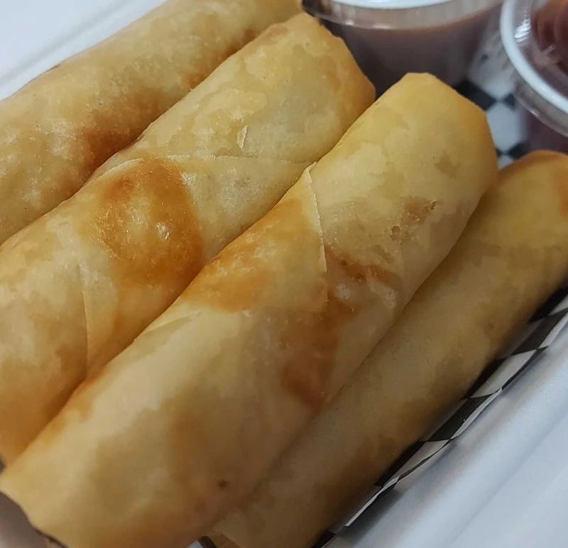 Crispy fried rolls served with sweet chilli dipping sauce at Kimchi Sushi, Keewatin, Winnipeg