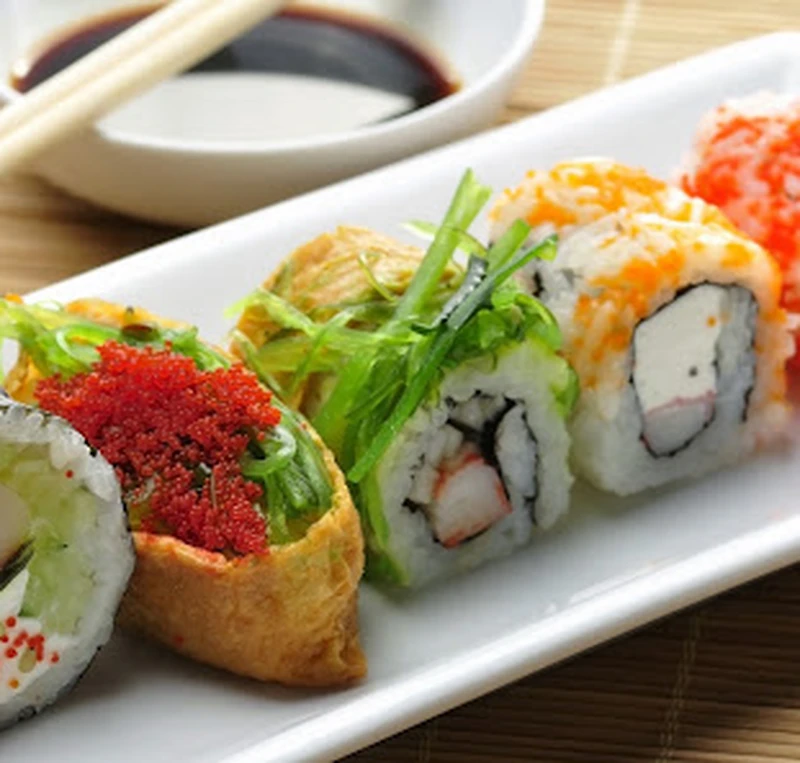 Assorted sushi rolls with tobiko and seaweed salad at Kimchi Sushi in northwest Winnipeg